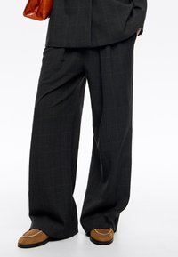 Широкие брюки Широкие брюки