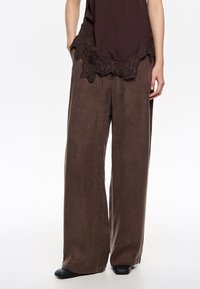 Широкие брюки Широкие брюки