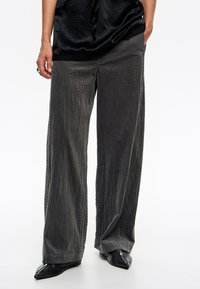 Широкие брюки Широкие брюки