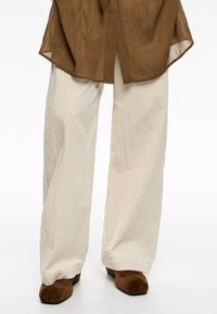 Широкие брюки Широкие брюки