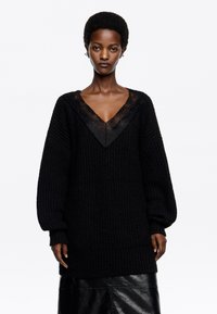 Длинный пуловер Длинный пуловер