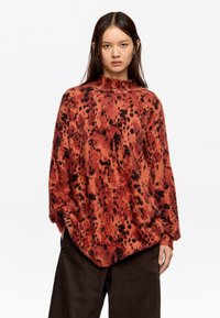 Длинный пуловер Длинный пуловер