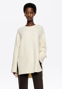 Длинный пуловер Длинный пуловер