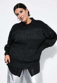 Длинный пуловер