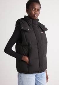 Пуховой жилет