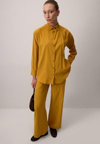 Широкие брюки Широкие брюки