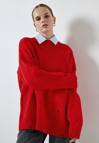 Длинный пуловер