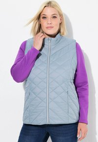 Жилет Жилет