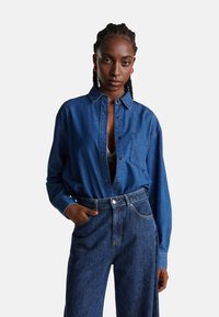 Джинсовая блузка