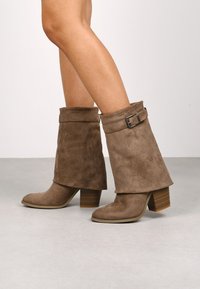 Ковбойские сапоги