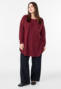 Длинный пуловер