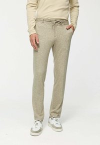 Льняные брюки