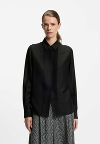 Шелковая блузка