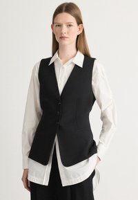 Жилет Жилет