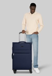 Чемодан на колесах Чемодан на колесах