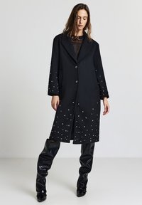 Шерстяное пальто