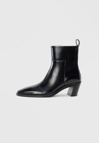 Ковбойские сапоги