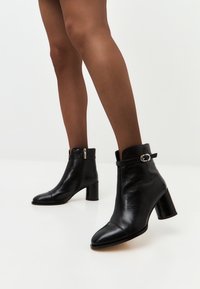 Ковбойские сапожки