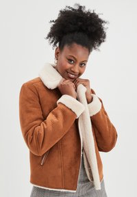 Кожаная куртка