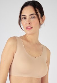 Бюстгальтер без косточек Бюстгальтер без косточек