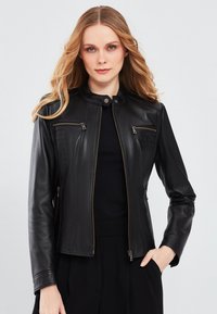 Кожаная куртка