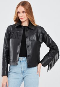 Кожаная куртка