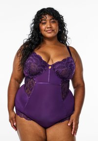 Слитный купальник