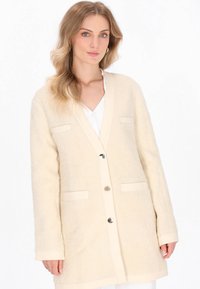 Шерстяное пальто