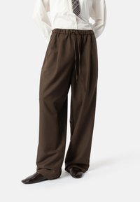 Широкие брюки Широкие брюки