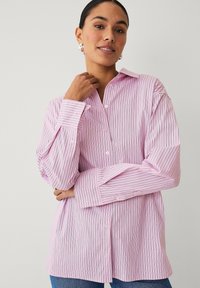 Длинная блузка