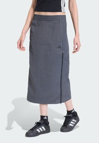 Юбка с накладными карманами