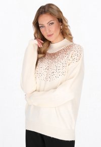 Длинный пуловер