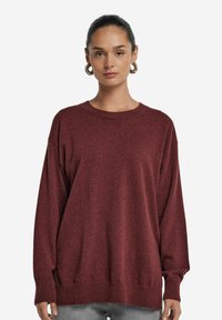 Длинный пуловер