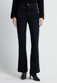 Клешеные брюки Клешеные брюки