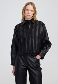 Кожаная куртка