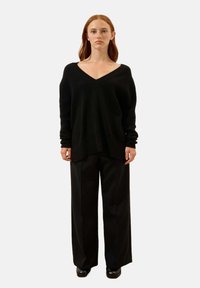 Длинный пуловер