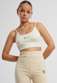 Топ на бретельках