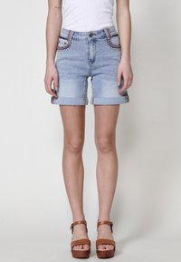 Джинсовые шорты