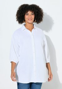 Длинная блузка Длинная блузка