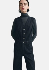 Джинсовая жилетка