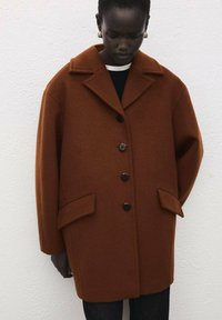 Шерстяное пальто