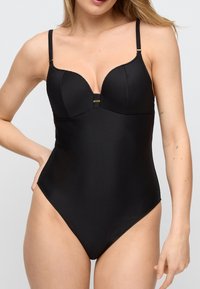 Слитный купальник