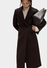 Шерстяное пальто