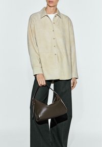 Кожаная сумка