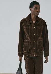 Джинсовая куртка Джинсовая куртка