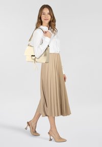 Кожаная сумка