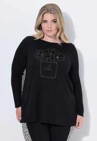 Длинный пуловер