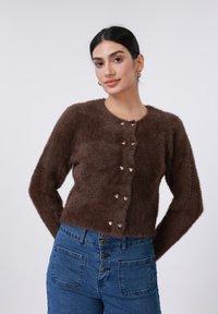 Пуховой жилет