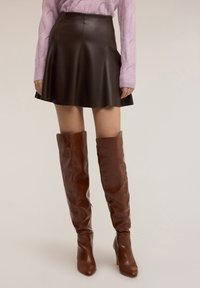 Кожаная юбка