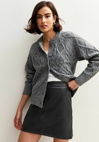 Кожаная юбка